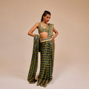 Woman wearing a patterned outfit on a beige background