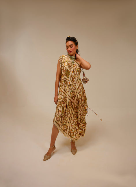 Woman wearing a patterned dress against a beige background
