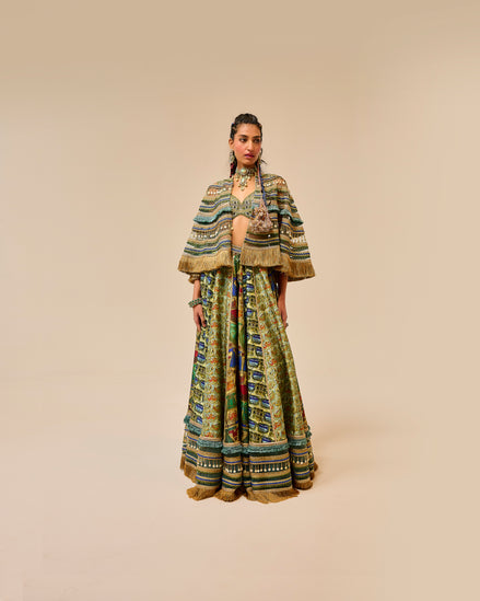 Woman wearing a patterned outfit on a beige background