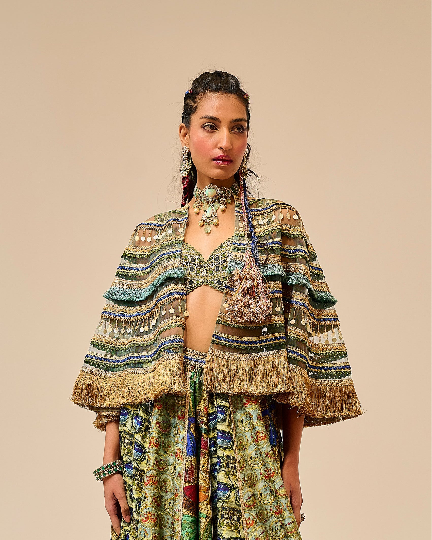 Woman wearing a patterned outfit on a beige background