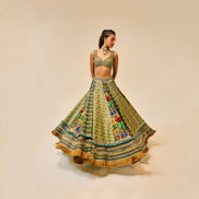 Woman wearing a colorful traditional outfit on a beige background