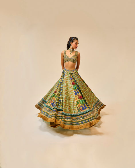 Woman wearing a colorful traditional outfit on a beige background