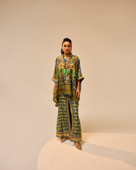 Woman wearing a colorful patterned outfit on a beige background