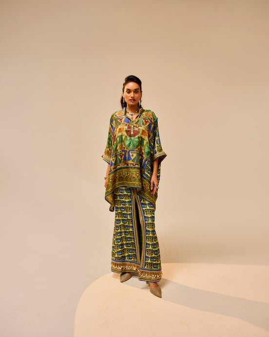 Woman wearing a colorful patterned outfit on a beige background
