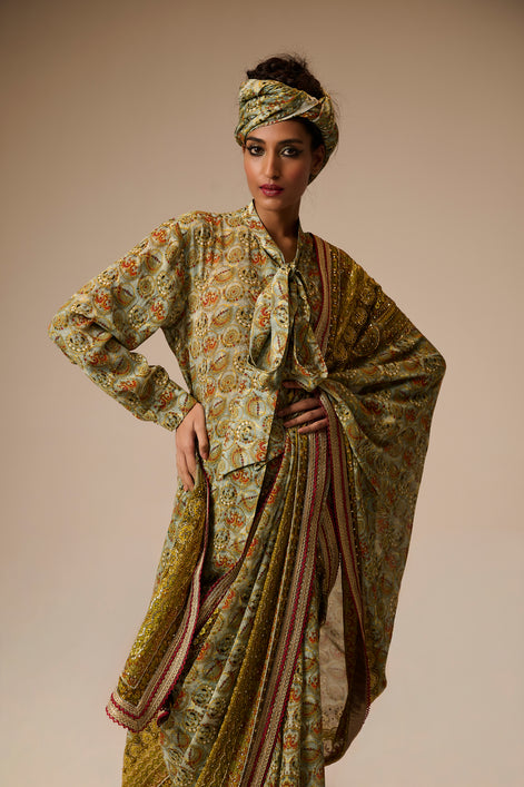 Woman wearing a traditional outfit with a floral pattern on a beige background